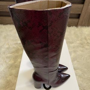 Aldo Kinkuna faux snakeskin knee high boots.